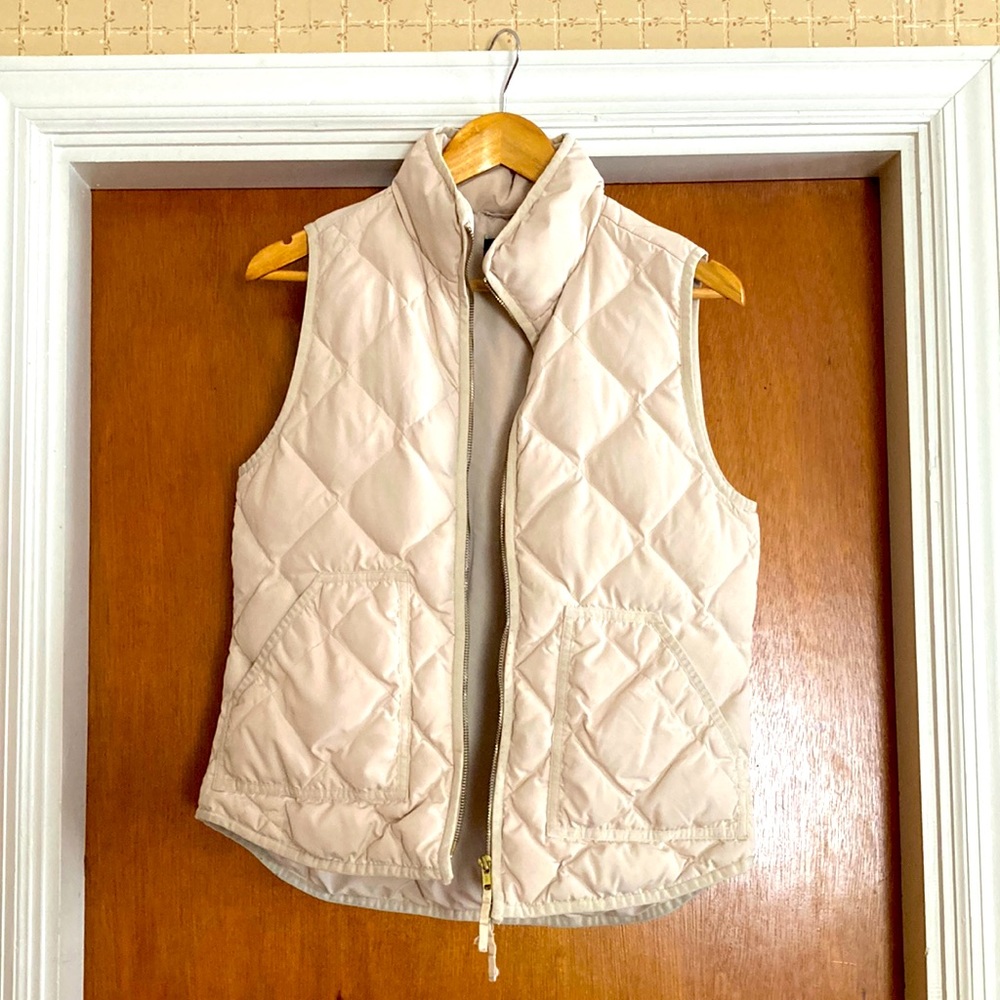 J Crew size small down vest. Machine washable. Beige/cream color.